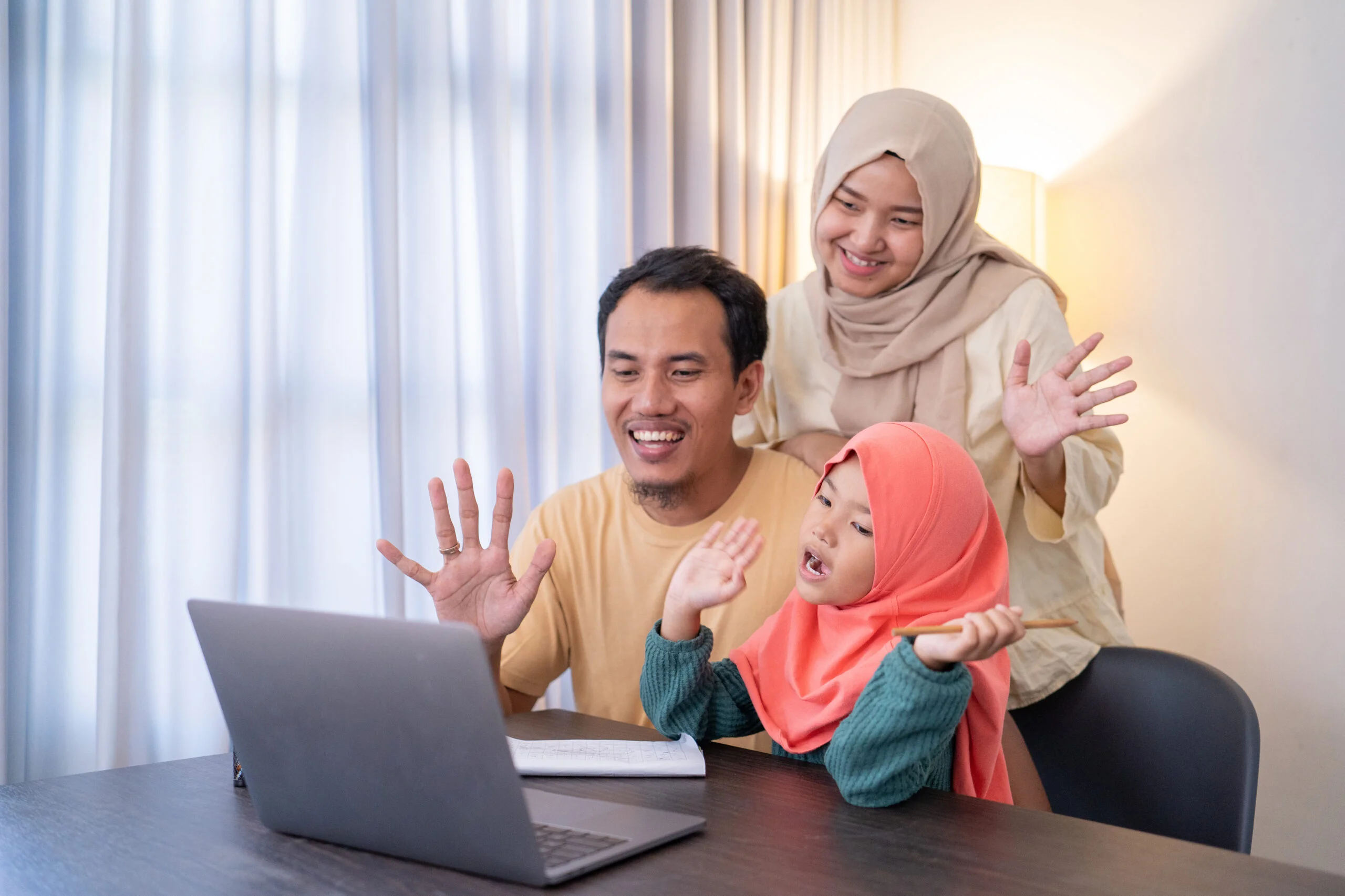 A Muslim family attending online Quran class